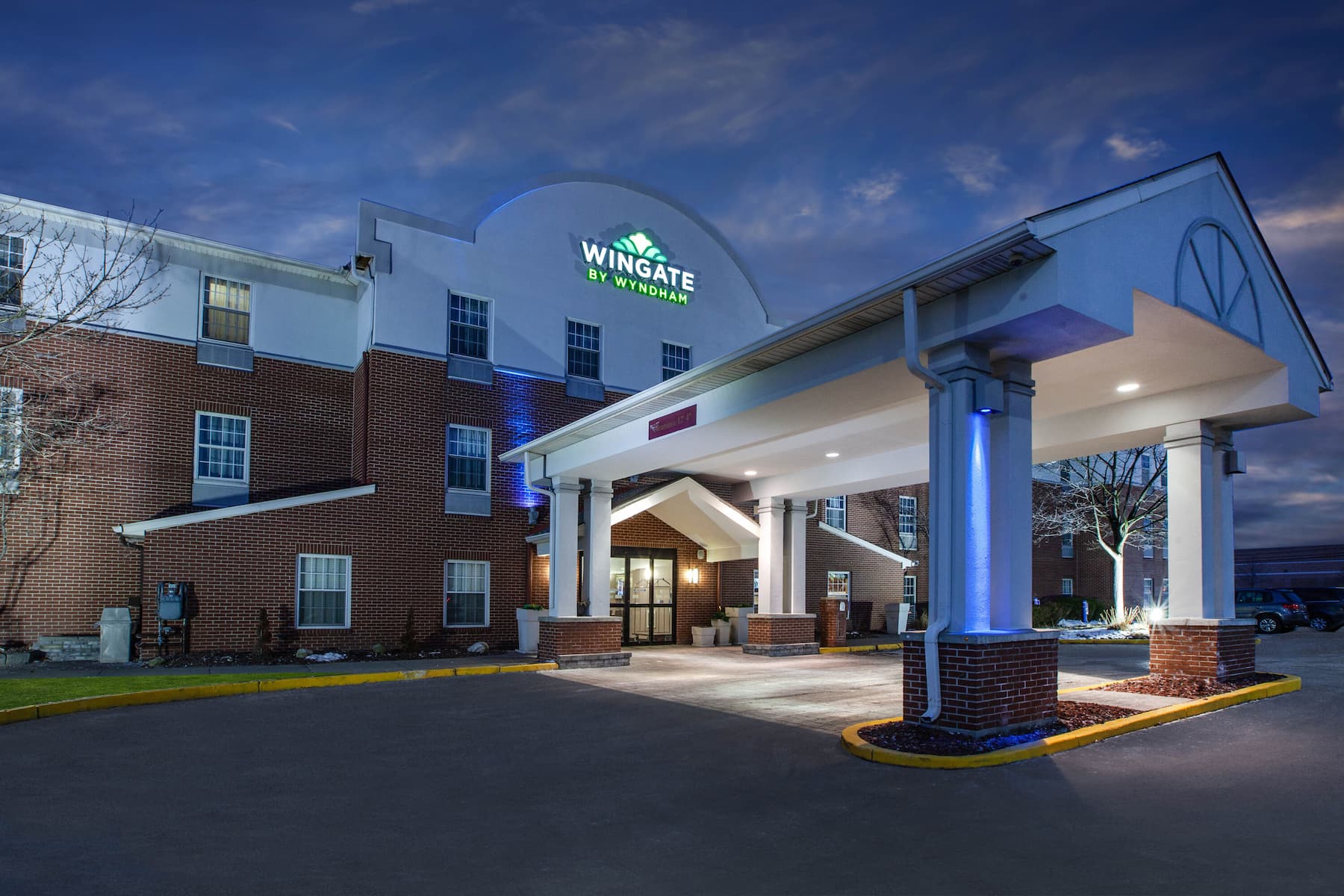 Wingate hotel exterior at dusk